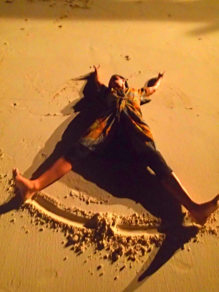 Making angels in the sand